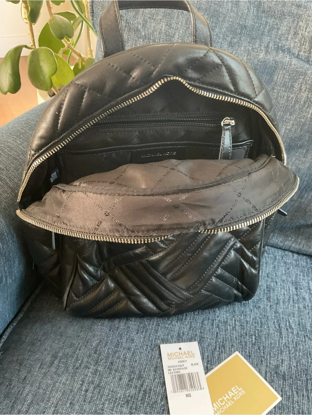 Michael Kors Abbey Black Quilted Leather Backpack - silver hardware